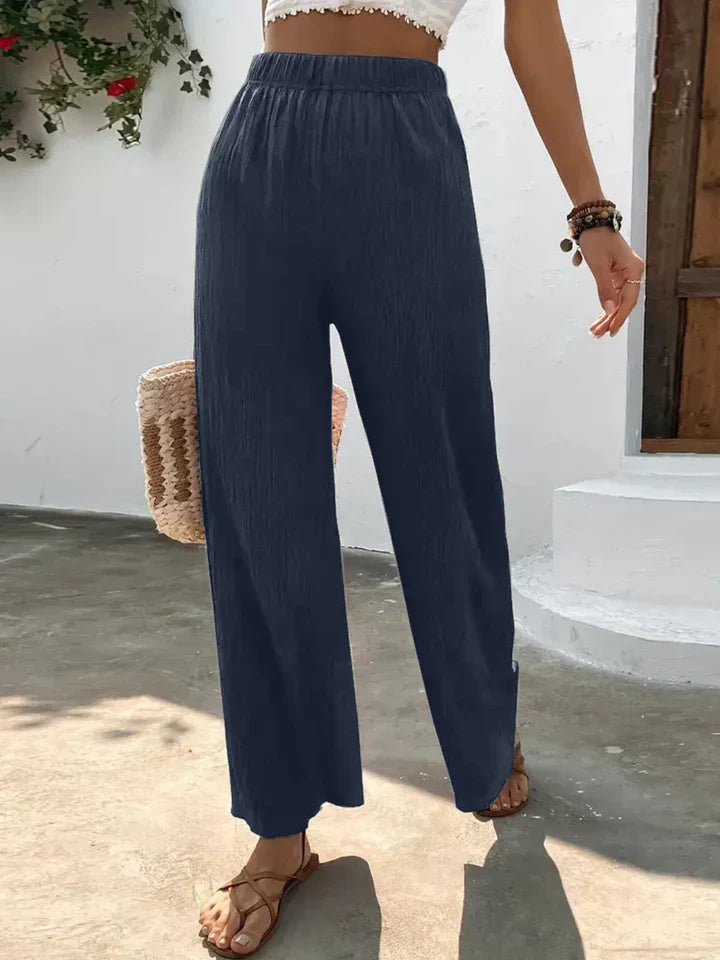 "Luchtige boho-stijl dames palazzo broek met wijde pijpen en elastische tailleband, ideaal voor zomer en casual looks."