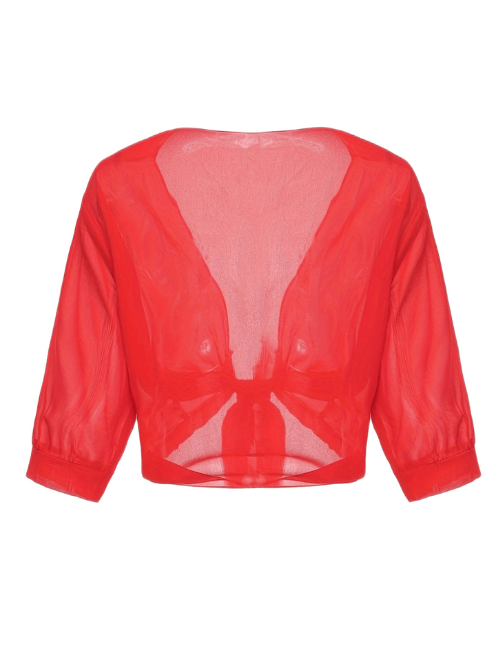 "Luchtige chiffon bolero met striksluiting en korte mouwen, elegant over zomeroutfits. Ideaal voor warme dagen en koele avond