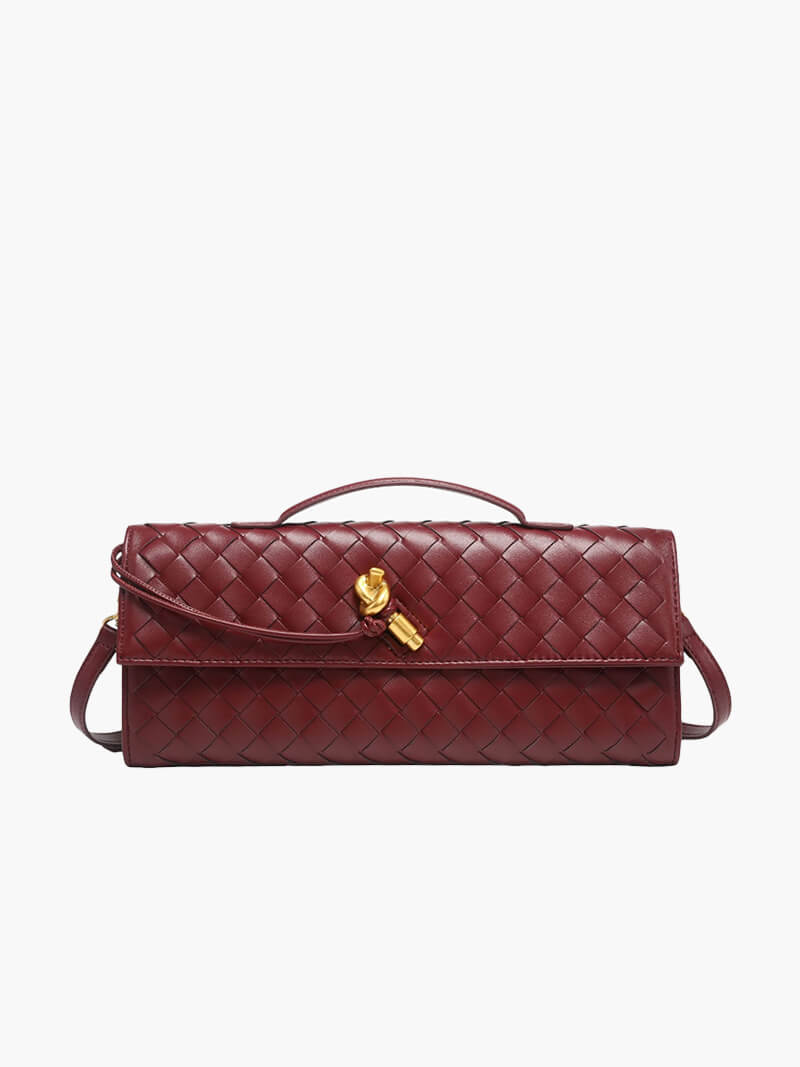 "Luxe geweven handtas in zwart met gouden sluiting, elegant en stijlvol ontwerp voor dames, ideaal voor elke gelegenheid."