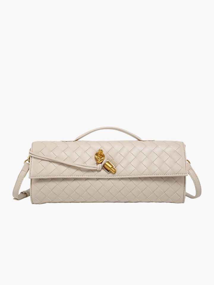 "Luxe geweven handtas in zwart met gouden sluiting, elegant en stijlvol ontwerp voor dames, ideaal voor elke gelegenheid."
