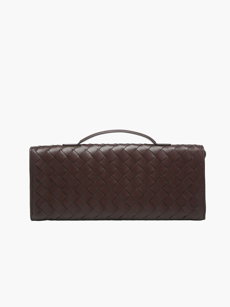"Luxe geweven handtas in zwart met gouden sluiting, elegant en stijlvol ontwerp voor dames, ideaal voor elke gelegenheid."