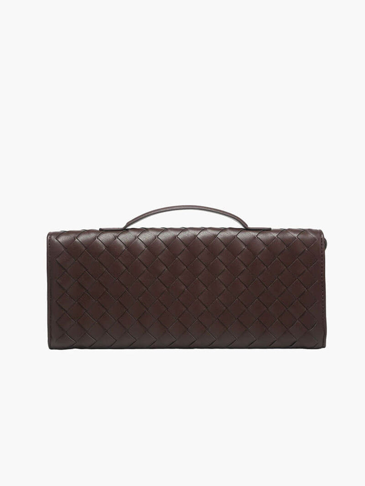 "Luxe geweven handtas in zwart met gouden sluiting, elegant en stijlvol ontwerp voor dames, ideaal voor elke gelegenheid."