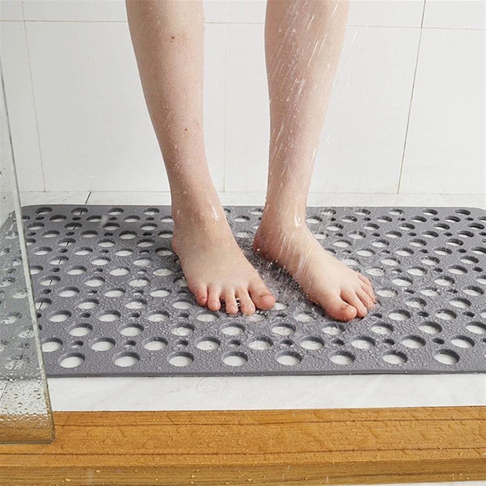 "Luxe grijze antislip douchemat met veilige zuignappen, schimmelbestendig design en efficiënt drainagesysteem voor hygiëne."