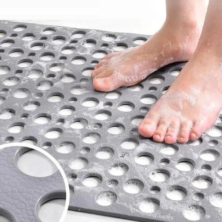 "Luxe grijze antislip douchemat met veilige zuignappen, schimmelbestendig design en efficiënt drainagesysteem voor hygiëne."