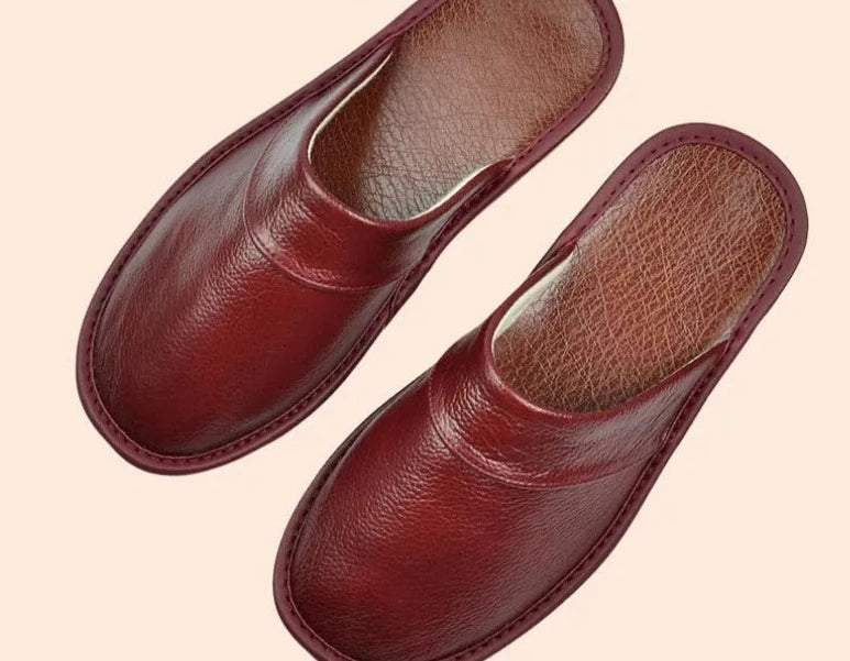"Luxe leren heren pantoffels met tijdloos design en ergonomische pasvorm, gemaakt van duurzaam rundleer voor optimaal comfort