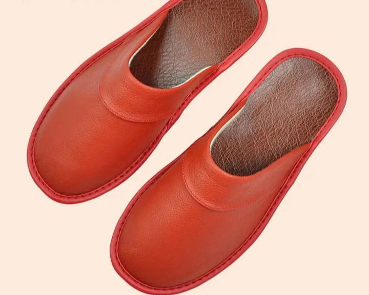 "Luxe leren heren pantoffels met tijdloos design en ergonomische pasvorm, gemaakt van duurzaam rundleer voor optimaal comfort
