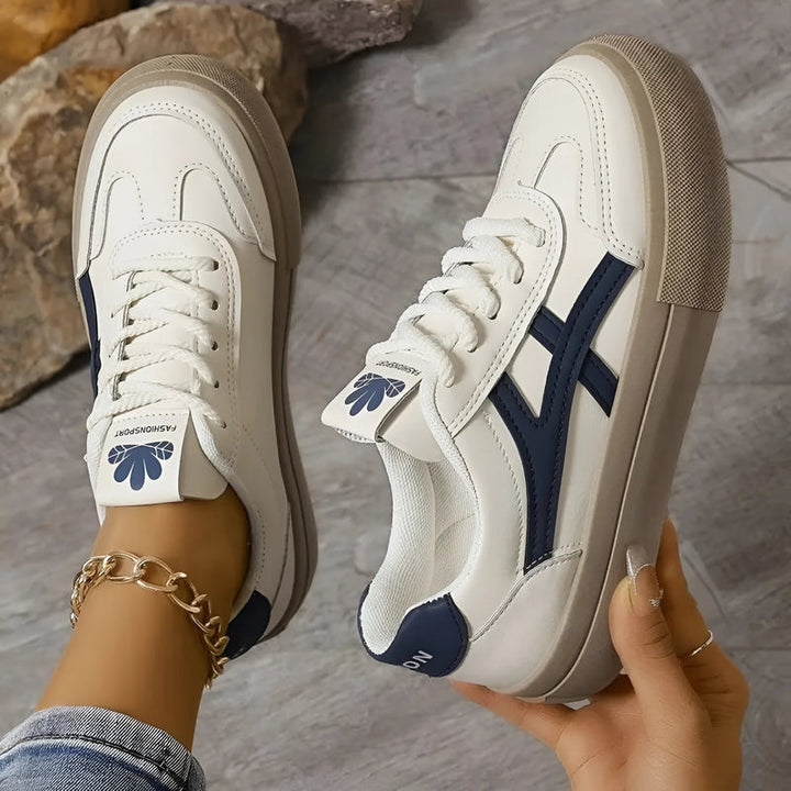 "Luxe orthopedische sport sneakers, bruin en blauw, ademend mesh, schokabsorberende zool, damesmaat 36-41."