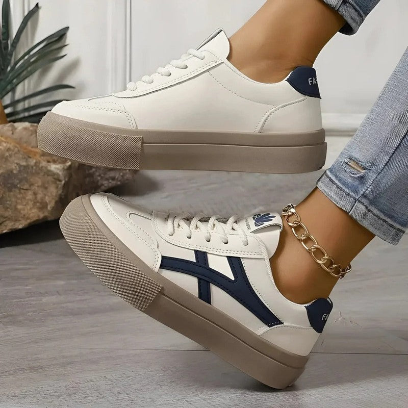"Luxe orthopedische sport sneakers, bruin en blauw, ademend mesh, schokabsorberende zool, damesmaat 36-41."