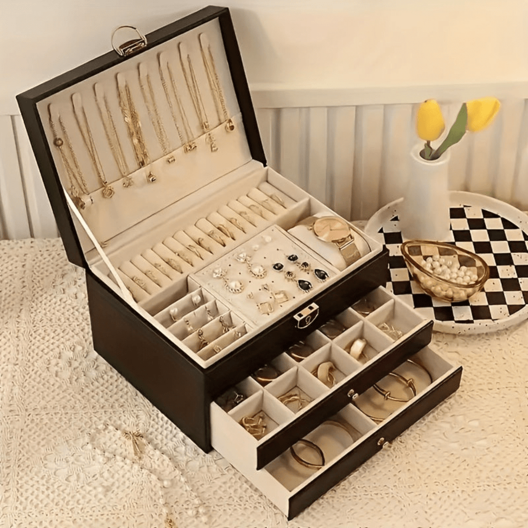 "Luxe sieraden organizer box met vakken voor kettingen, ringen en armbanden, elegant en praktisch ontwerp."