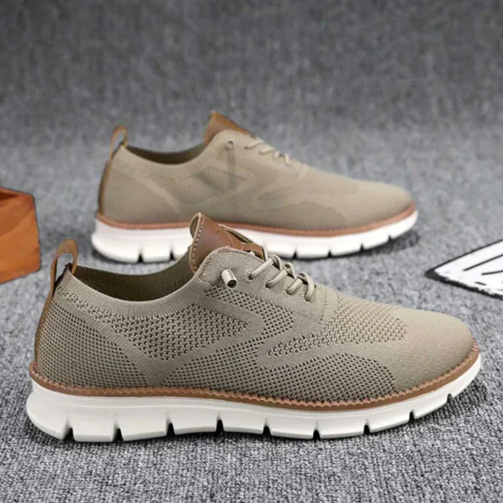 "Mesh sneakers voor heren, ademend en flexibel, in olijfgroen. Comfortabel met luchtig ontwerp en schokabsorberende zool."
