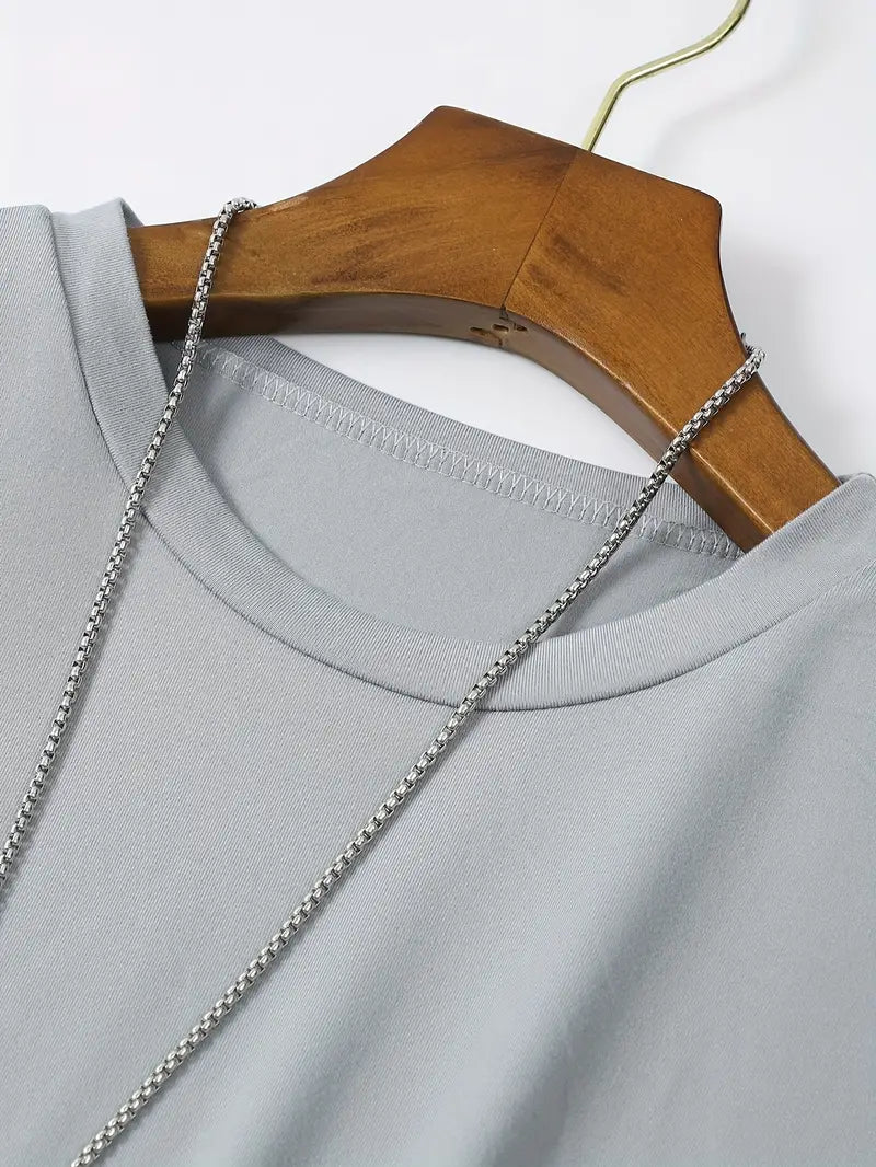 "Modern katoenen heren T-shirt, stijlvolle eenvoud, effen ontwerp, perfecte pasvorm, comfortabel en veelzijdig."