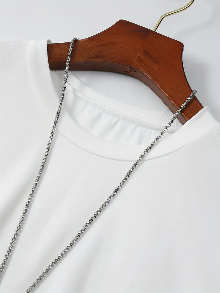 "Modern katoenen heren T-shirt, stijlvolle eenvoud, effen ontwerp, perfecte pasvorm, comfortabel en veelzijdig."