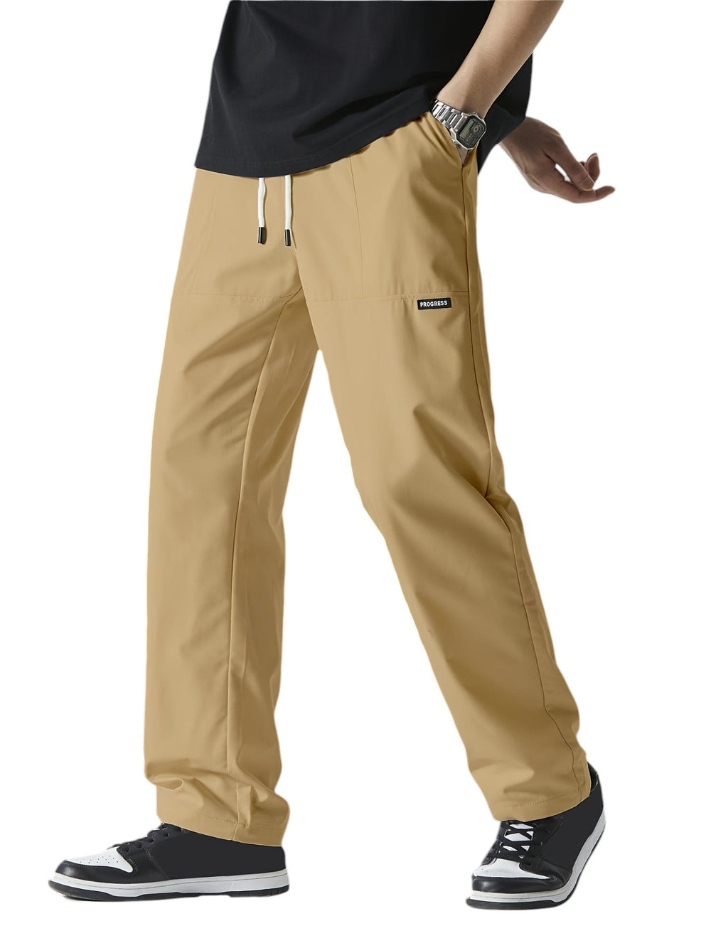 "Moderne heren joggingbroek, strakke pasvorm, zachte luchtige stof, elastische tailleband met trekkoord, casual stijl."