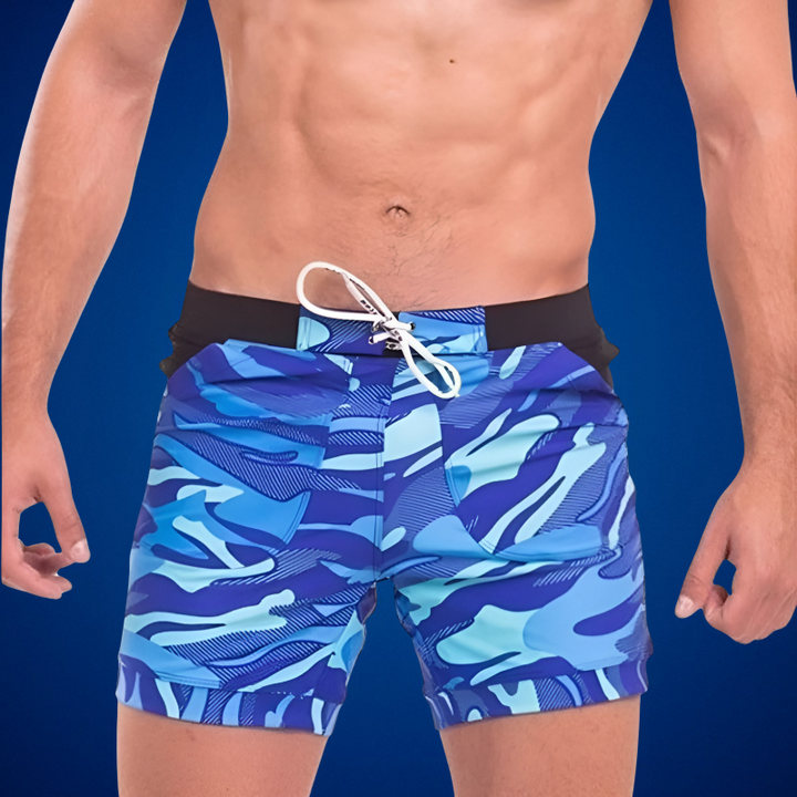 "Modieuze heren zwembroek in diverse kleuren, sneldrogend, met zijzakken en tailleband; ideaal voor strand en sport."