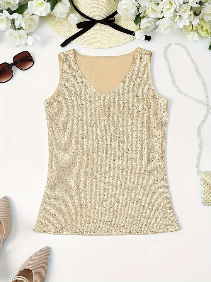 "Mouwloze top met V-hals en glinsterende pailletten, elegant en lichtgewicht, perfect voor zomerse feestjes."