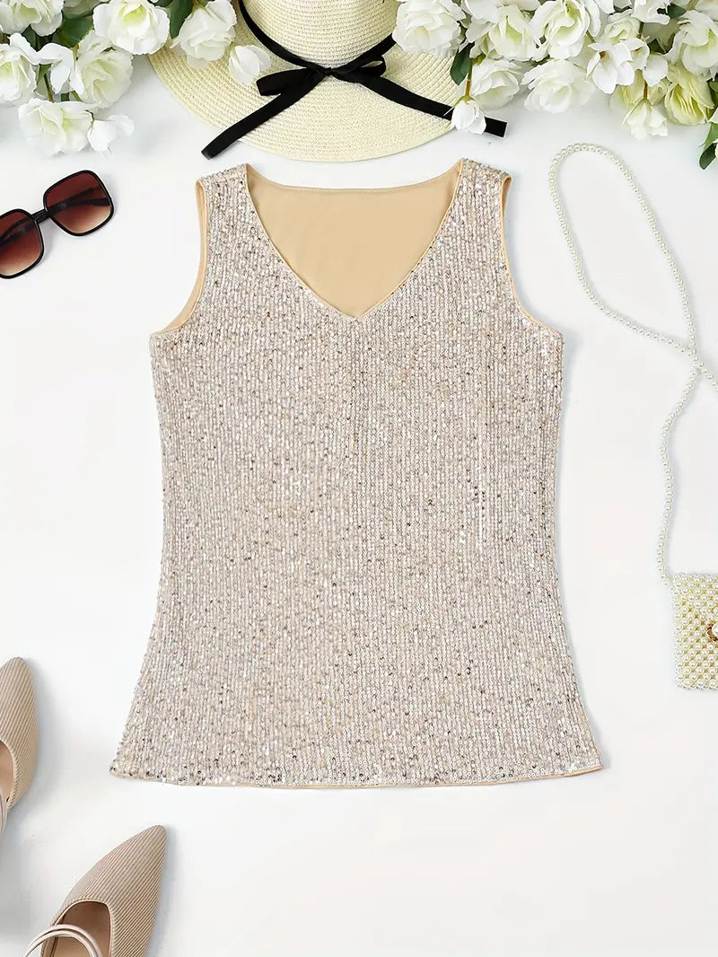 "Mouwloze top met V-hals en glinsterende pailletten, elegant en lichtgewicht, perfect voor zomerse feestjes."