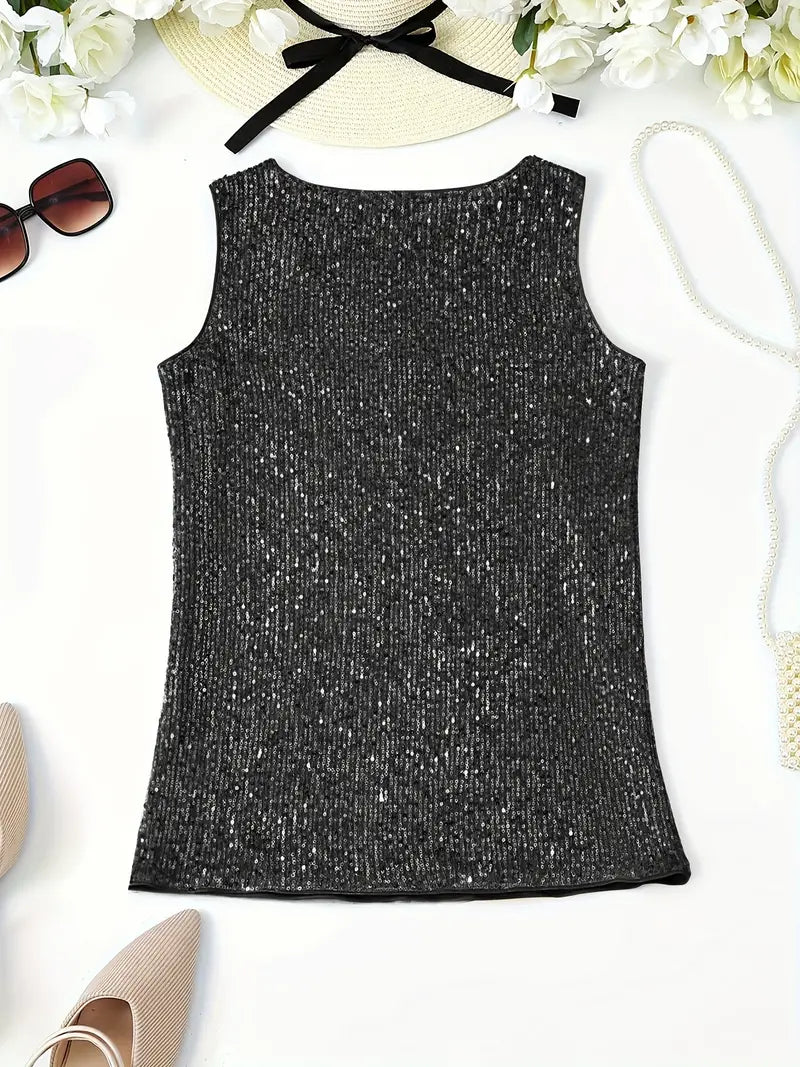 "Mouwloze top met V-hals en glinsterende pailletten, elegant en lichtgewicht, perfect voor zomerse feestjes."