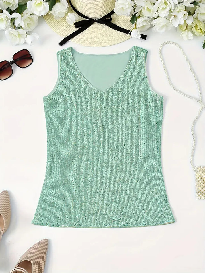 "Mouwloze top met V-hals en glinsterende pailletten, elegant en lichtgewicht, perfect voor zomerse feestjes."