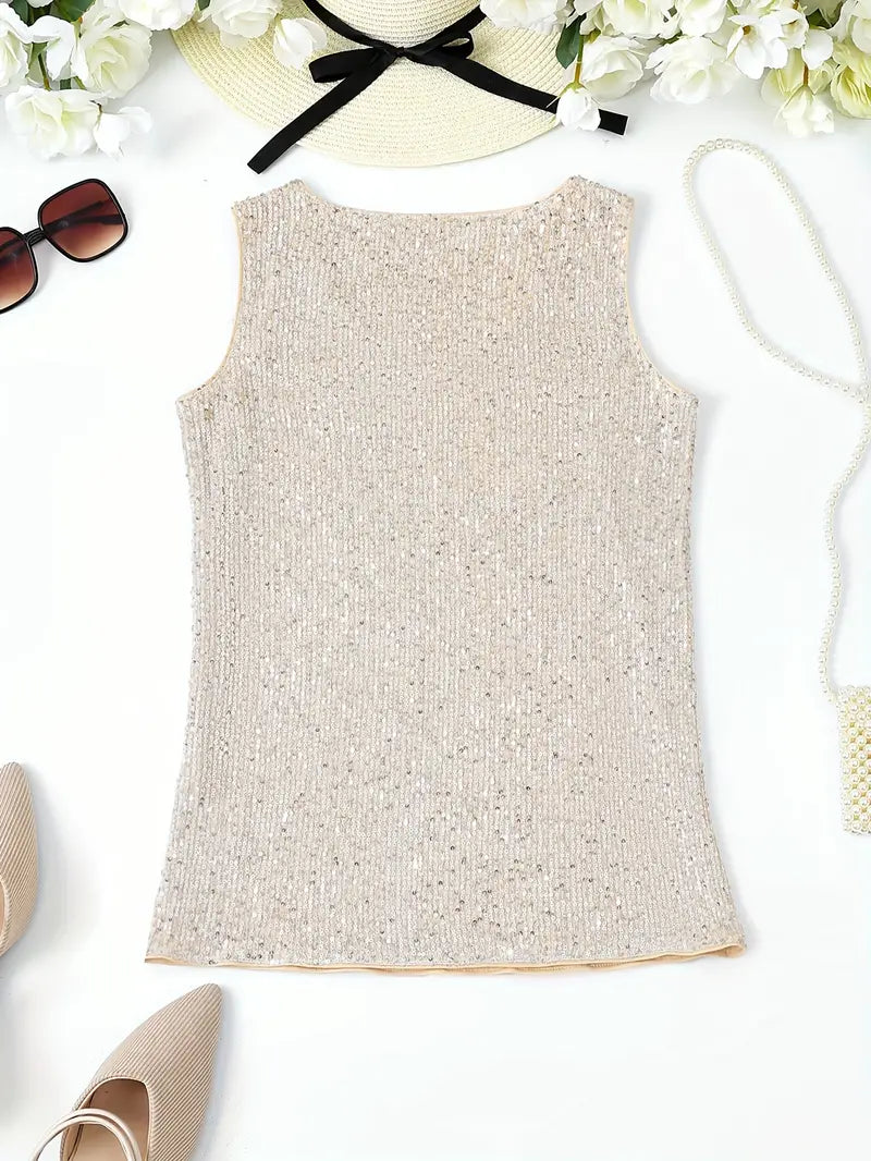 "Mouwloze top met V-hals en glinsterende pailletten, elegant en lichtgewicht, perfect voor zomerse feestjes."