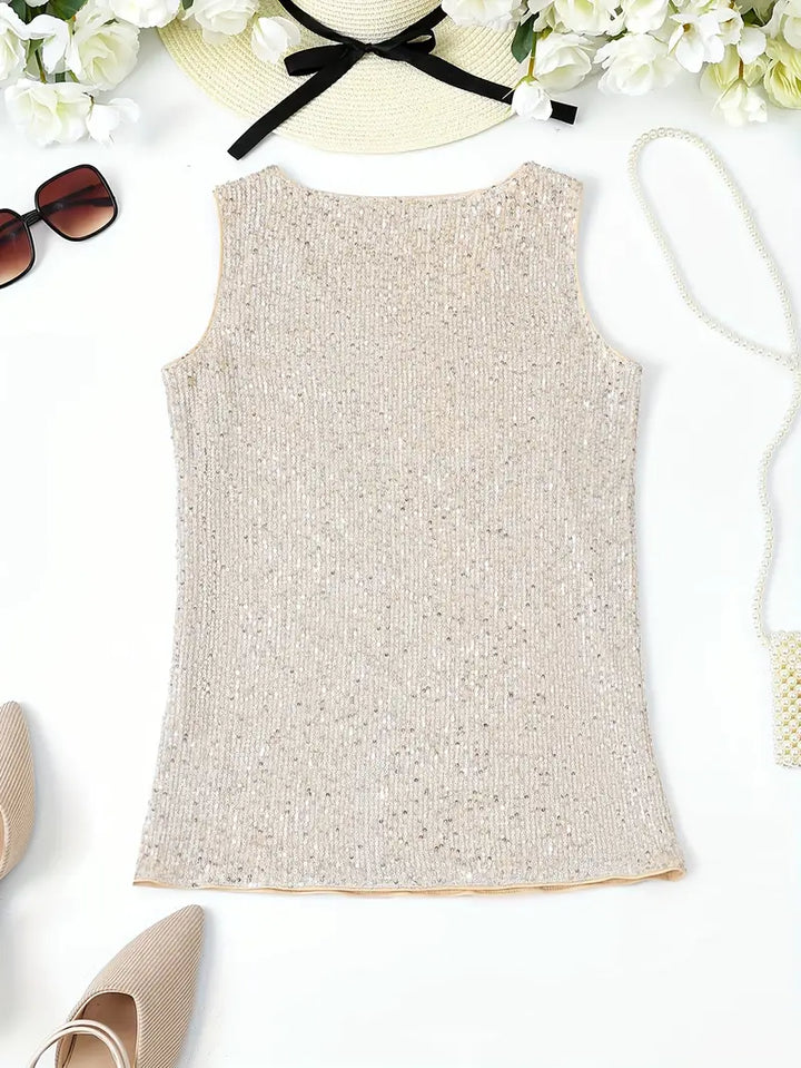 "Mouwloze top met V-hals en glinsterende pailletten, elegant en lichtgewicht, perfect voor zomerse feestjes."