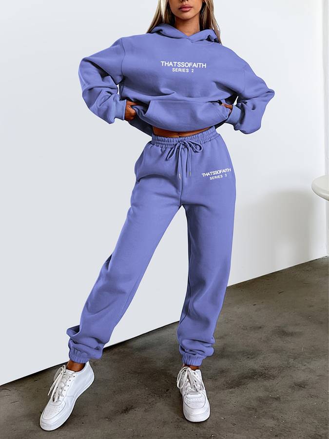 "Neutral beige loungewear set dames, oversized sweater en joggingbroek, grafische print, elastische tailleband voor comfort."