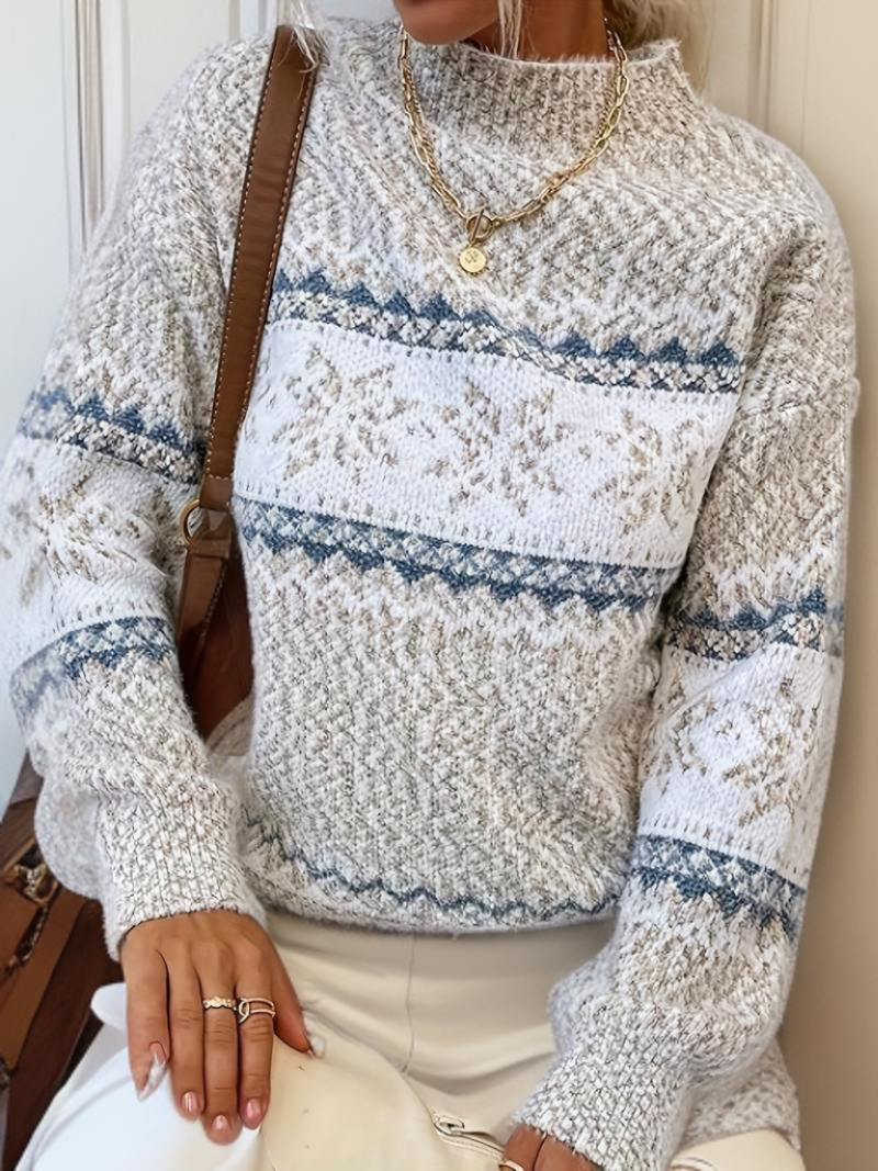 "Noorse wollen trui voor dames, Scandinavische stijl met sneeuwvlokkenmotief, warmte en elegantie."