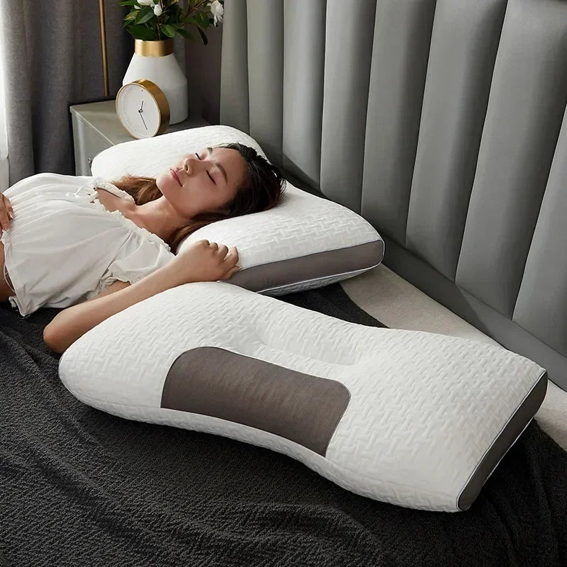 Orthopedisch kussen met massagefunctie, wit met grijze accenten, voor nek- en schoudersteun en ultiem slaapcomfort.