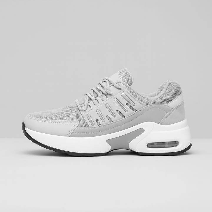 "Orthopedische damessneakers met voetboogondersteuning, ademend mesh en suède, anti-slip zool in zwart en beige."
