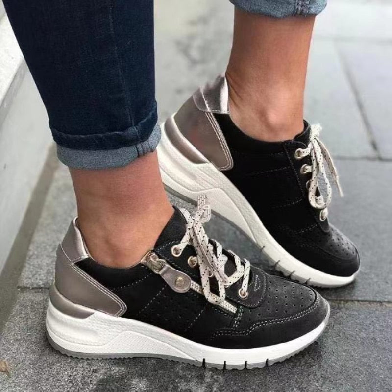 "Orthopedische dameswandelschoenen met veters, brede teenbox en anatomische steun voor comfort en dagelijkse wandelingen."