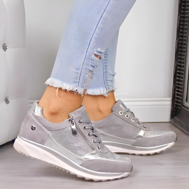 "Orthopedische dameswandelschoenen, stijlvolle grijze sneakers met goede ondersteuning en duurzaam materiaal."