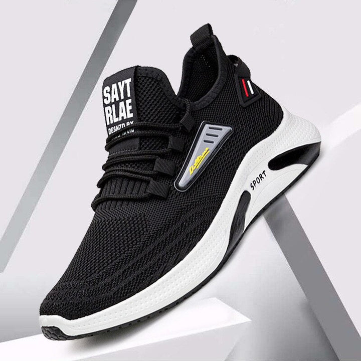 "Orthopedische heren sportschoenen in beige en zwart, met ademend honingraat ontwerp voor comfort en stabiliteit."