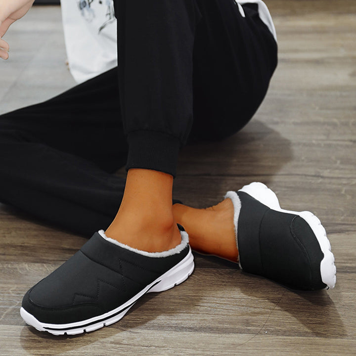 "Orthopedische herenpantoffels met ergonomisch voetbed, zachte voering en antislipzool voor herfst- en wintercomfort."