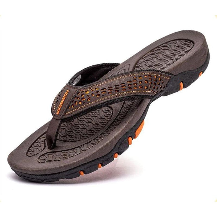 "Orthopedische slippers heren met ademend bovenwerk en comfortabel voetbed, ideaal voor zowel thuis als buiten."