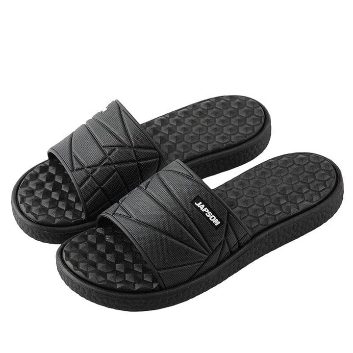 "Orthopedische slippers heren met ademend bovenwerk en comfortabel voetbed, ideaal voor zowel thuis als buiten."