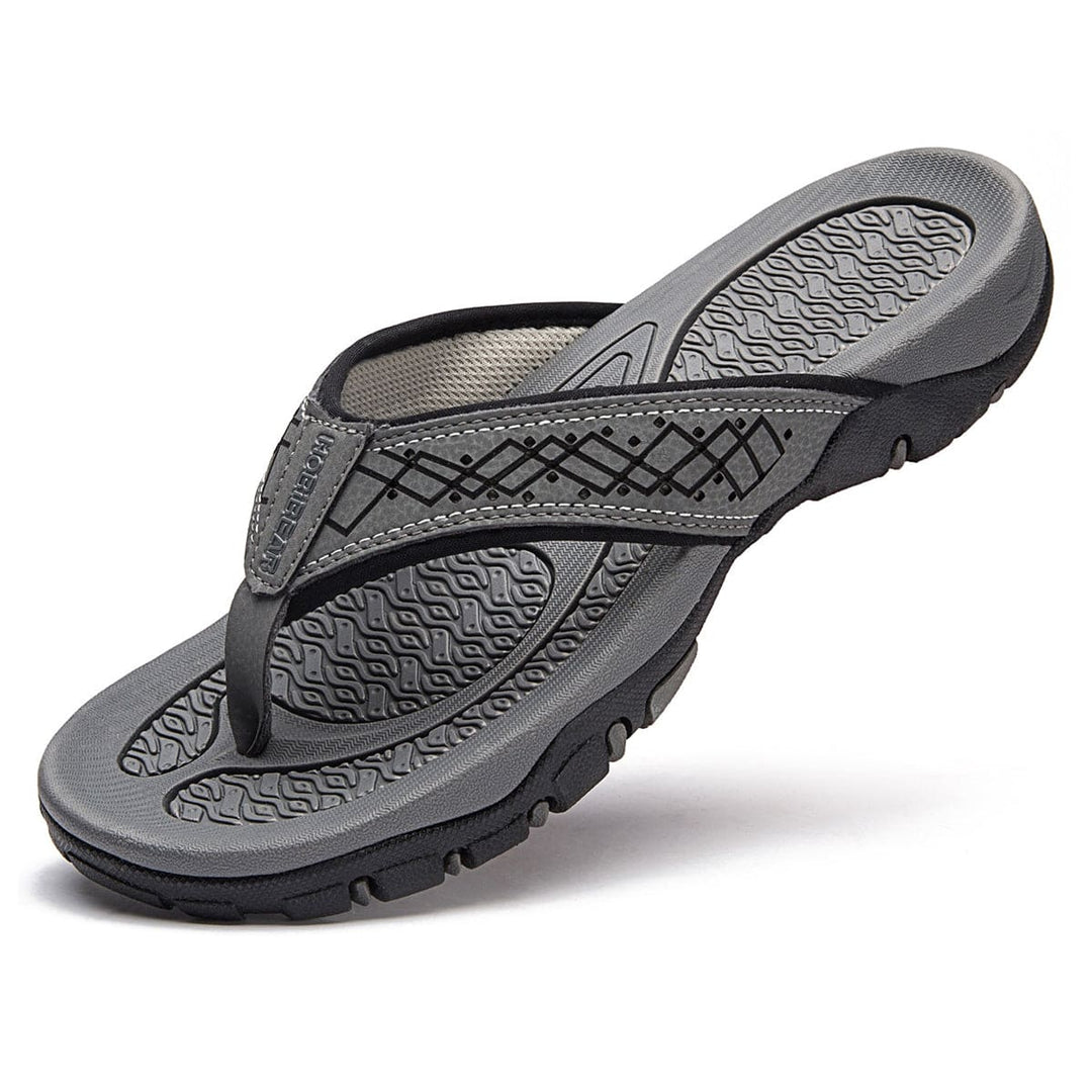 "Orthopedische slippers heren met ademend bovenwerk en comfortabel voetbed, ideaal voor zowel thuis als buiten."