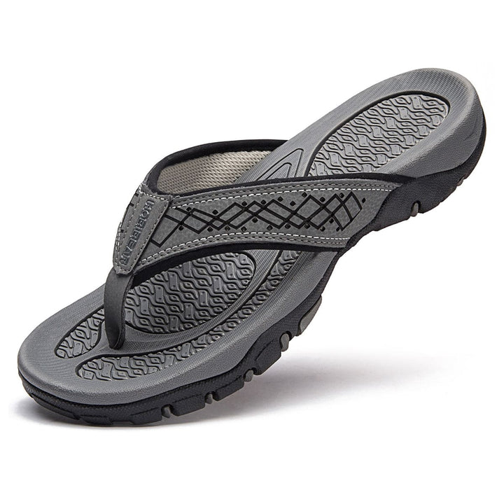 "Orthopedische slippers heren met ademend bovenwerk en comfortabel voetbed, ideaal voor zowel thuis als buiten."
