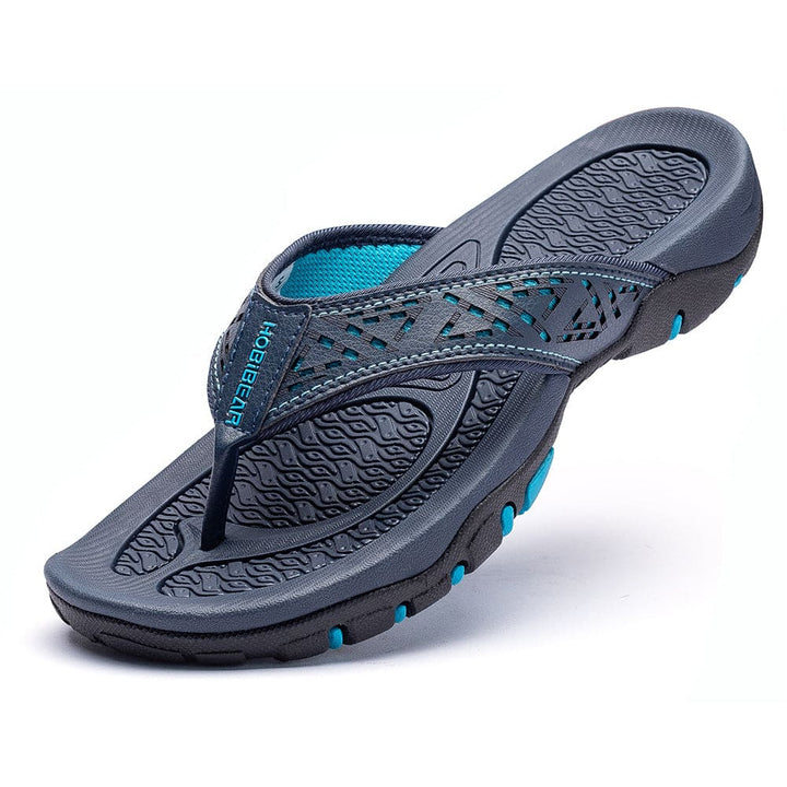 "Orthopedische slippers heren met ademend bovenwerk en comfortabel voetbed, ideaal voor zowel thuis als buiten."