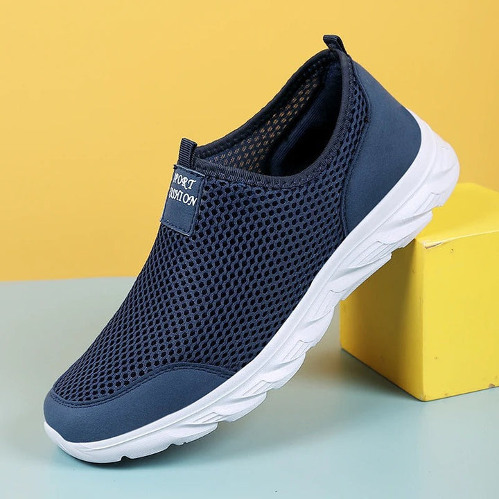 "Orthopedische sportschoenen voor heren, antislip rubberen zolen, blauw, grijs, zwart. Ultiem comfort en ondersteuning."