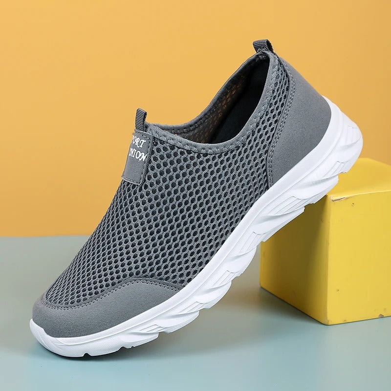 "Orthopedische sportschoenen voor heren, antislip rubberen zolen, blauw, grijs, zwart. Ultiem comfort en ondersteuning."