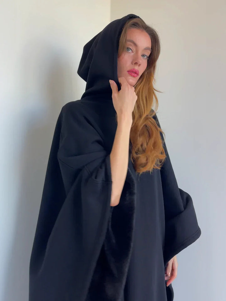 "Oversized Eden Hoodie Blanket in zachte stof, biedt ultiem comfort en warmte. Beschikbaar in diverse kleuren."