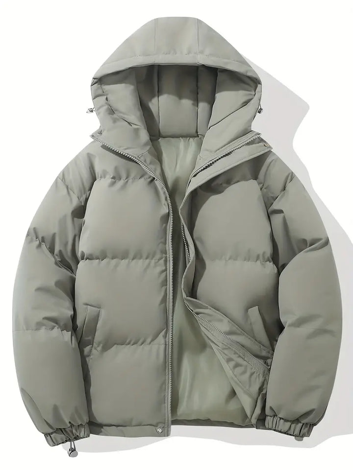 Roze dames winterjas met verstelbare capuchon, isolerende voering en elastische manchetten voor comfort en stijl.