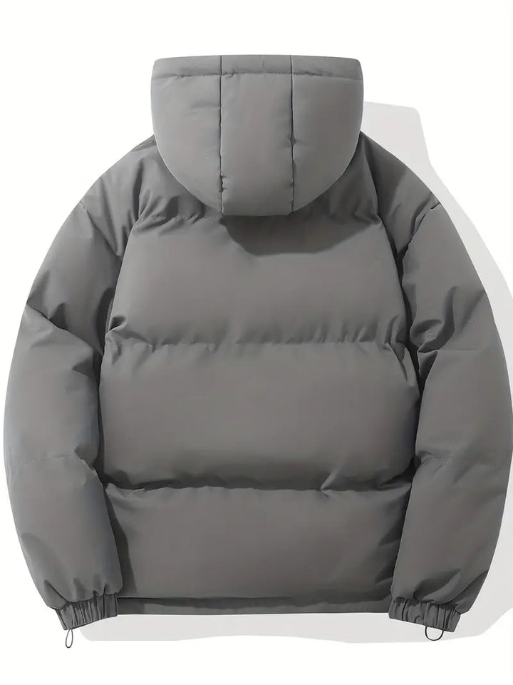 Roze dames winterjas met verstelbare capuchon, isolerende voering en elastische manchetten voor comfort en stijl.