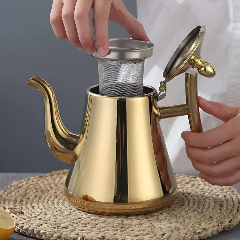 "RVS waterkoker met ingebouwd filter en ergonomisch handvat, zilver, modern design, geschiktheid diverse warmtebronnen"