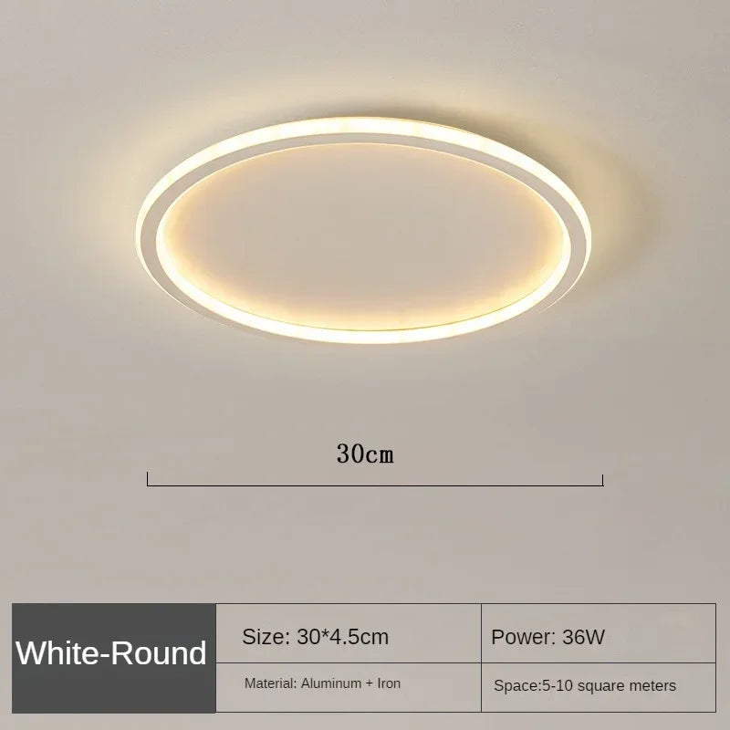 "Scandinavische ronde LED plafondlamp met minimalistisch ontwerp, metalen behuizing, glazen kap, past in modern interieur."