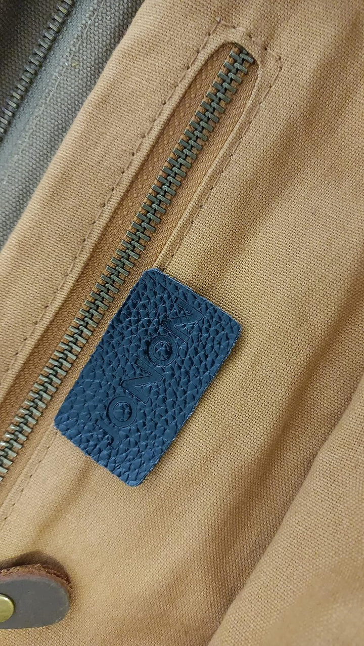 "Schoudertas Heren Canvas met Laptop Vakken, robuust en stijlvol, militaire uitstraling, geschikt voor dagelijks gebruik."