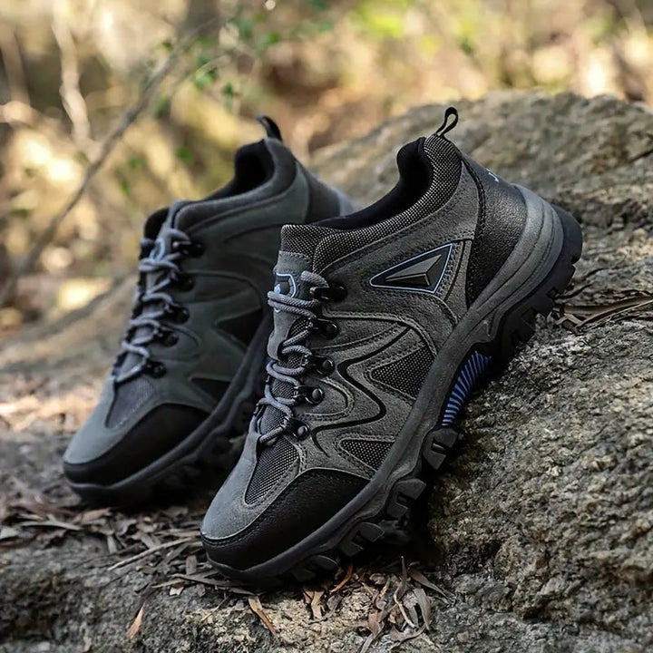 "Slijtvaste wandelschoenen voor mannen, robuust ontwerp, sterke waterdichte lagen, ideaal voor comfortabele avonturen."