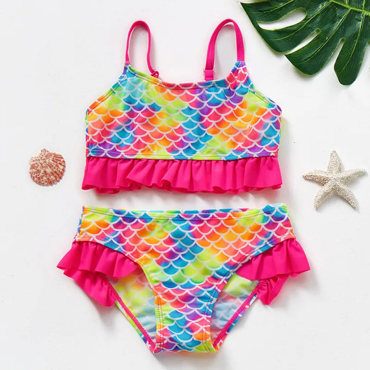 Sneldrogend kinderbikini set met kleurrijk design, ideaal voor strand of zwembad. Comfortabel, beschermend en speels.