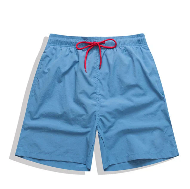 "Sneldrogende heren zwembroek met sportief design, elastische tailleband en praktische zakken voor strandactiviteiten."