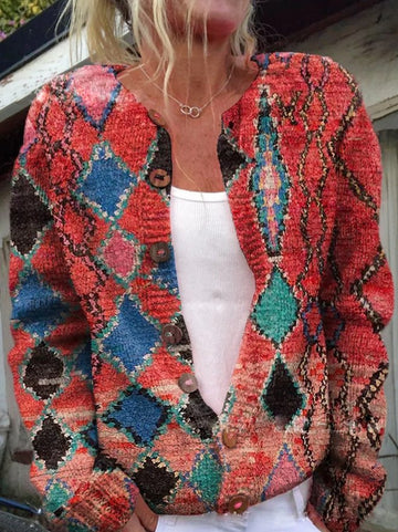 Stijlvol damesvest met kleurrijke bloemenprint, gebreid voor optimale warmte en comfort tijdens koude dagen.