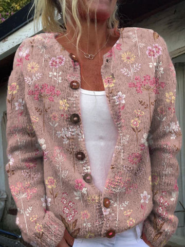 Stijlvol damesvest met kleurrijke bloemenprint, gebreid voor optimale warmte en comfort tijdens koude dagen.